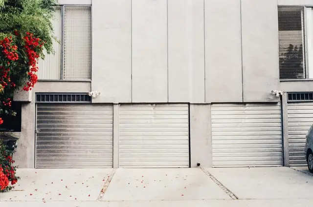 Garage doors and concrete driveway